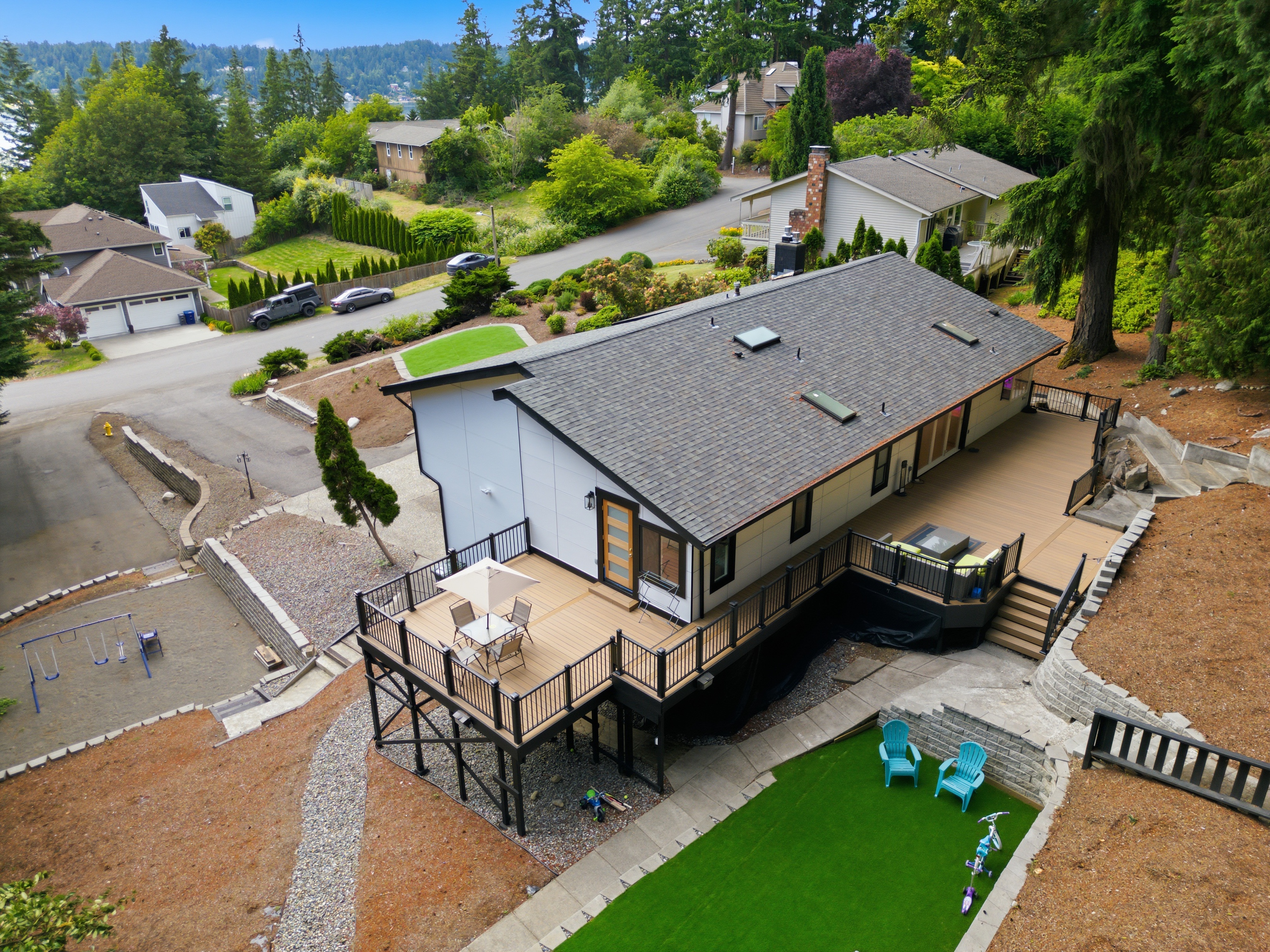 Park-like backyard with mature landscaping and outdoor entertaining space